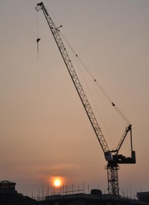Construction-crane-sunset_pos-statement